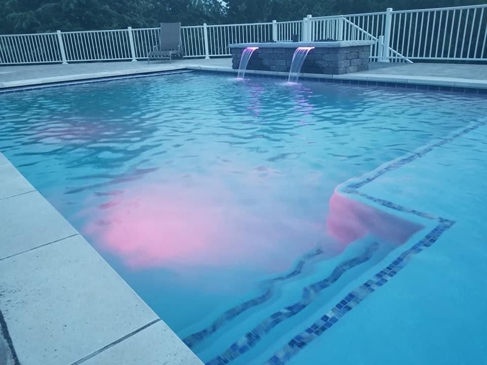 A pool lighted from within.